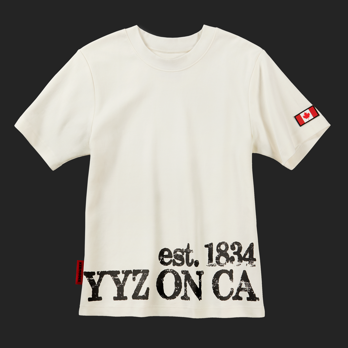 Front of off-white cream Toronto Heritage t-shirt with YYZ ON CA est. 1834 print and Canada flag patch on sleeve