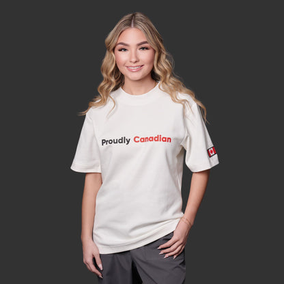 Female model wearing Proudly Canadian Unisex T-Shirt with raised high-density red Canadian and black Proudly typography on premium off-white cotton blend fabric