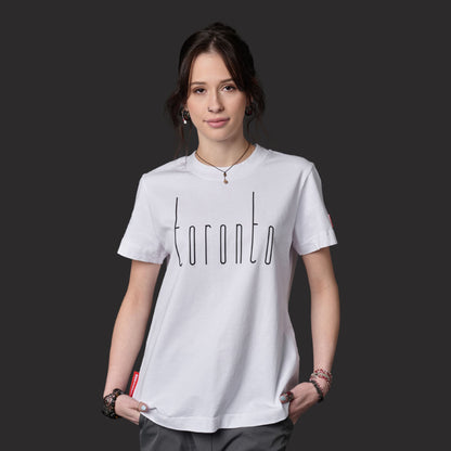 Female model wearing Toronto Ontario Women's T-Shirt with raised high-density Toronto graphic design