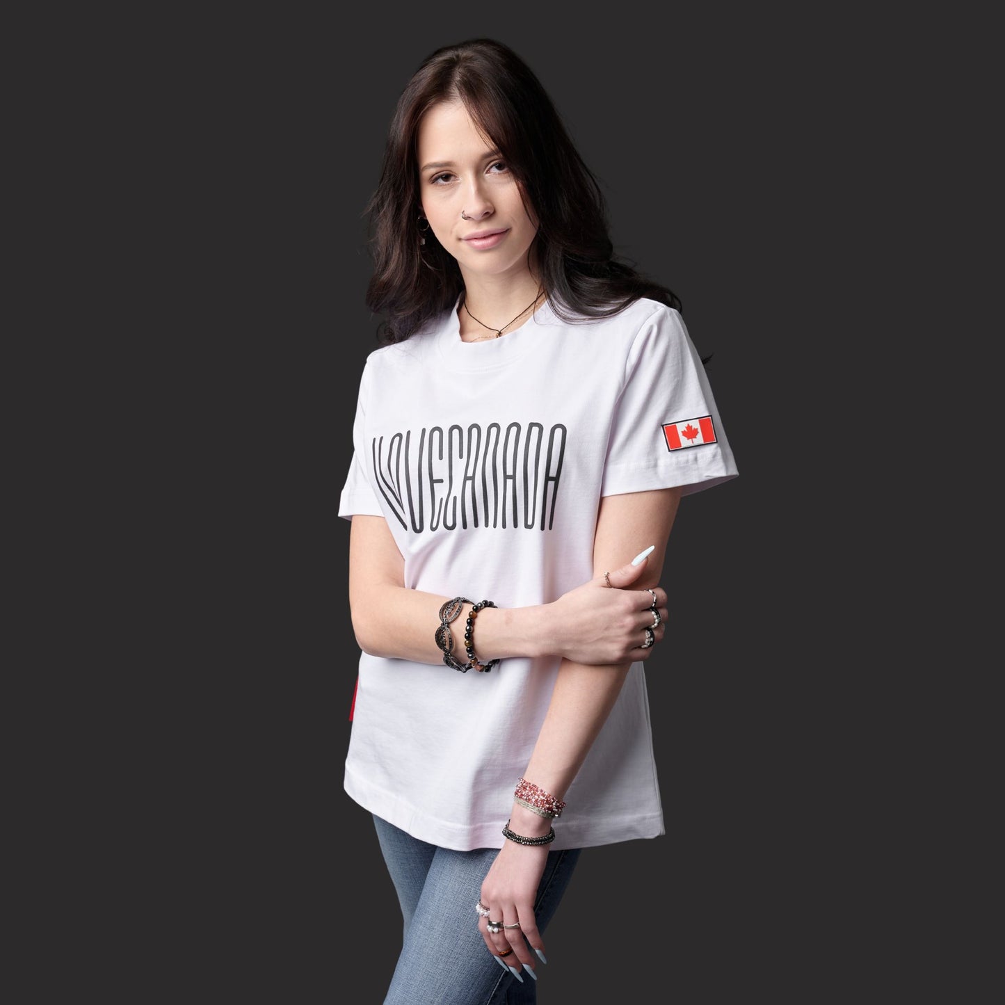 Female model wearing I Love Canada Women's T-Shirt in white cotton fabric with raised high-density typography