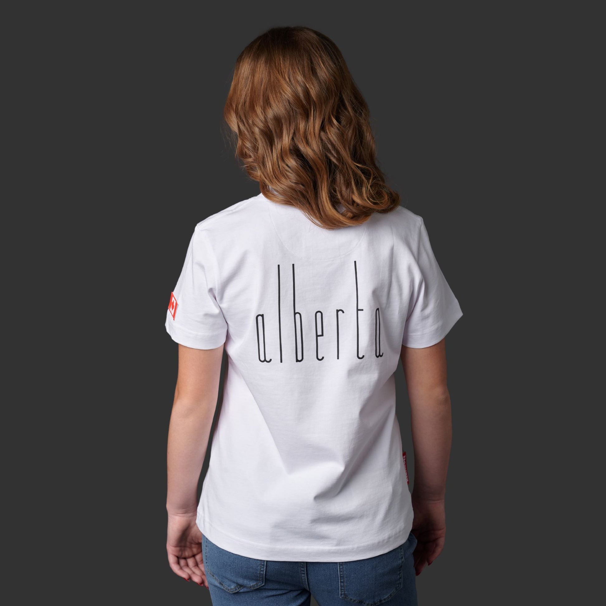 Back view of Calgary Alberta Women's T-Shirt featuring vertical Alberta lettering and classic women's fit