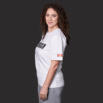 Side profile of female model wearing Canada Best Country Since 1867 Unisex T-Shirt showing unisex fit