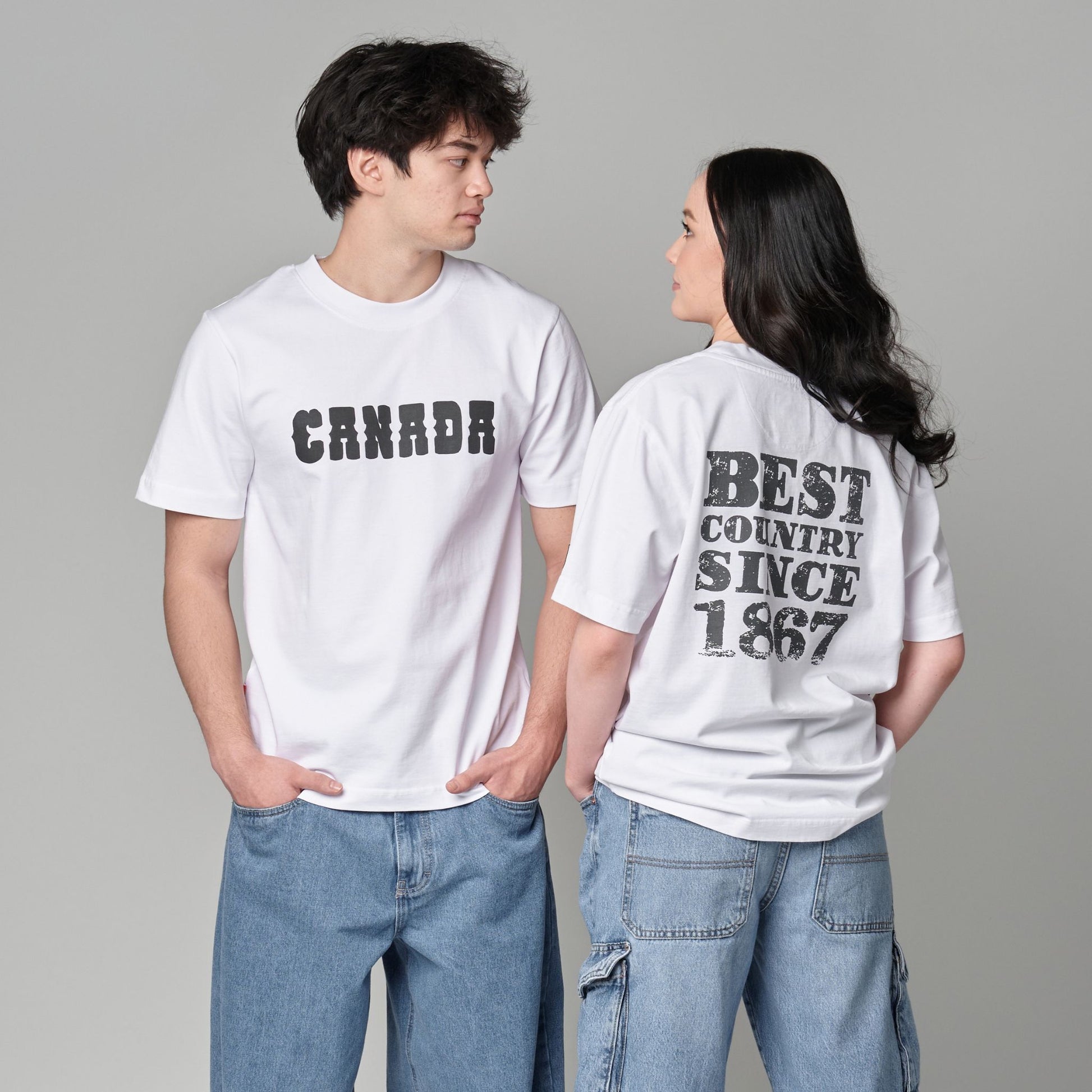 Male and female models wearing Canada Best Country Since 1867 Unisex T-Shirts showing front and back heritage designs