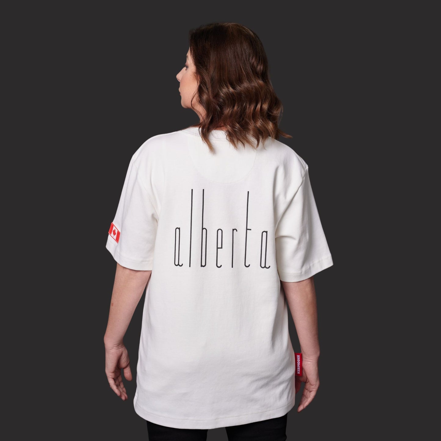 Back view of Calgary Alberta Unisex T-Shirt showing vertical Alberta lettering and classic unisex fit