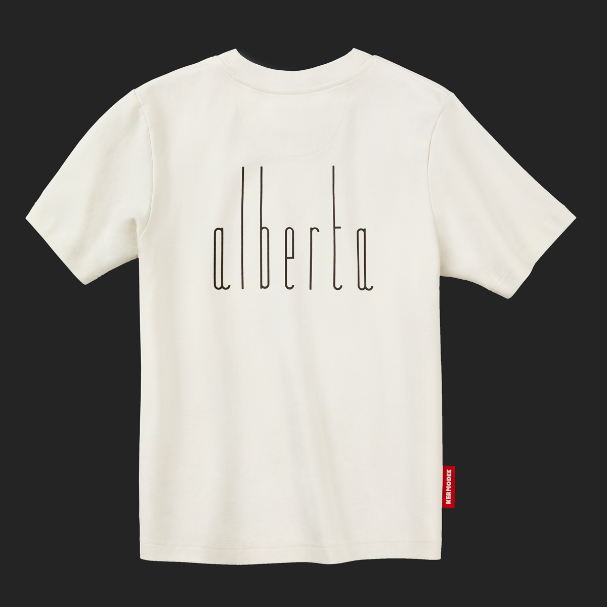 Back view of white cream t-shirt with thin black vertical Alberta lettering and red KERMODEE side label