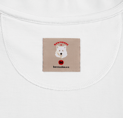 Close-up of inside woven label with Kermodee bear logo and website on white t-shirt