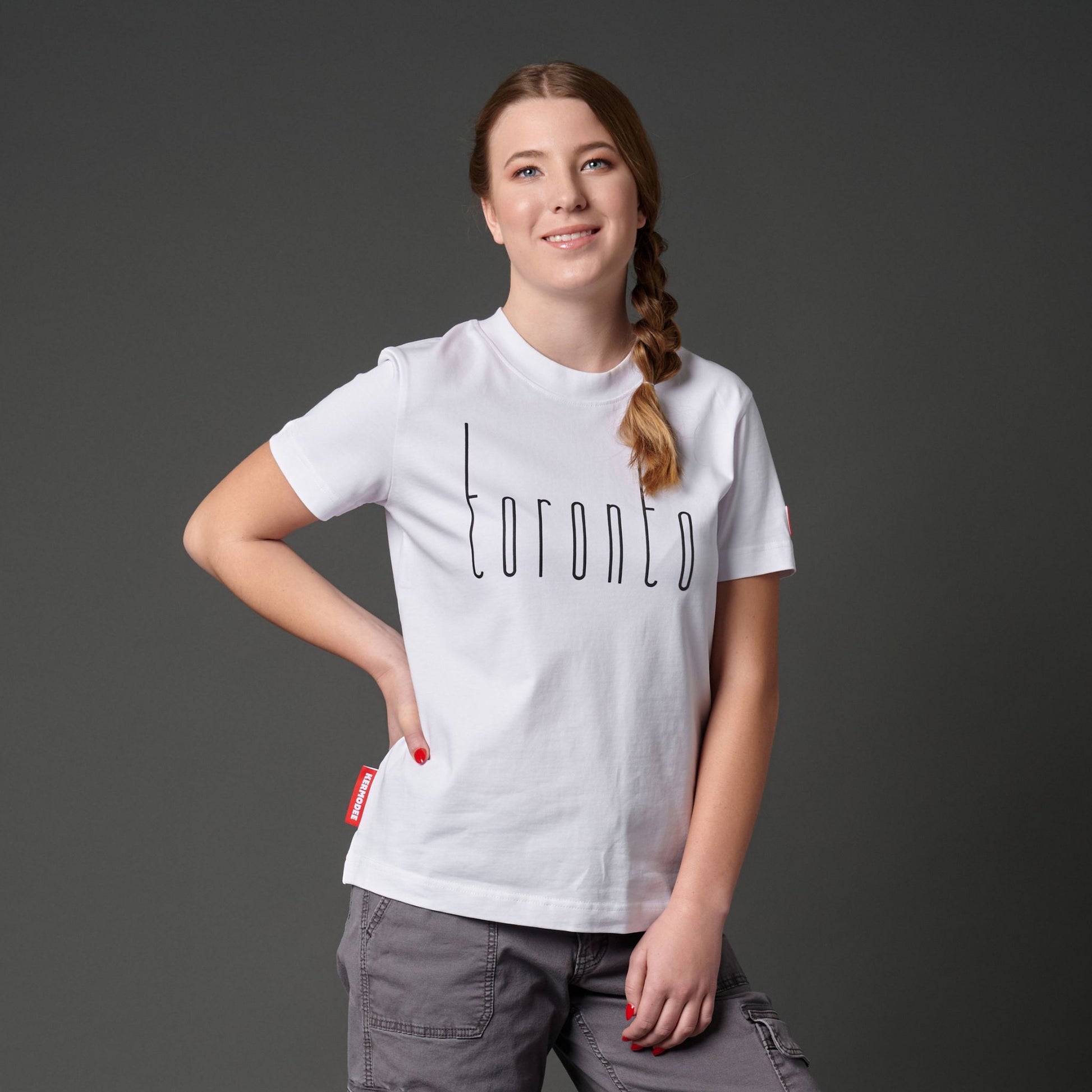 Female model wearing Toronto Ontario Women's T-Shirt featuring raised high-density Toronto city typography
