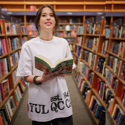 Lifestyle photo of female model wearing Montreal Quebec Heritage Unisex T-Shirt with distressed YUL QC CA EST. 1642 print